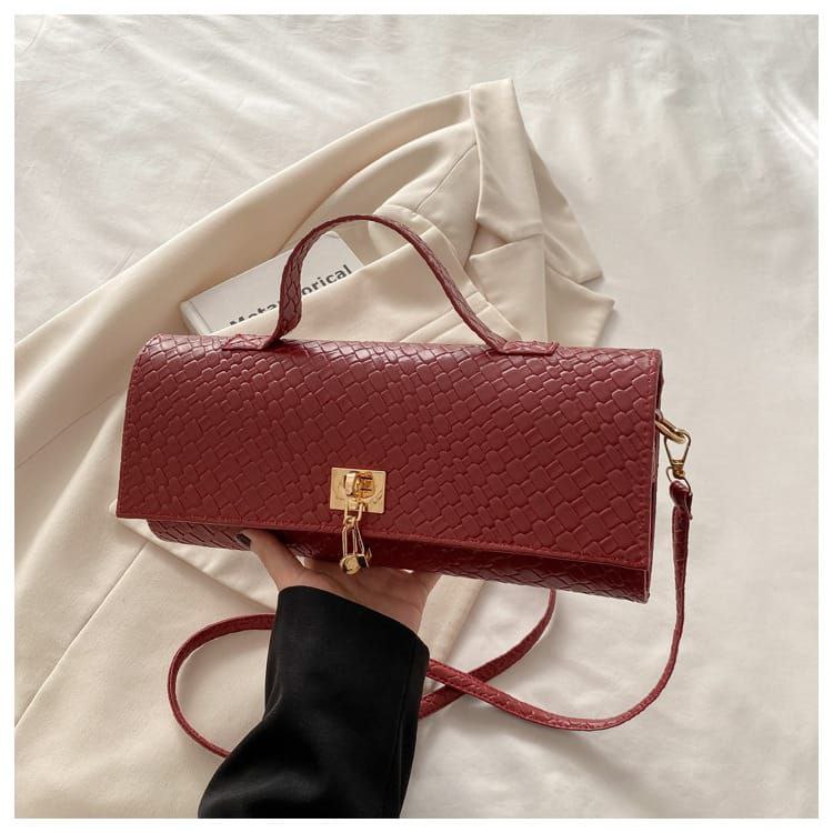 Bottega Veneta Triangle Bag – Bold Geometry, Iconic Luxury