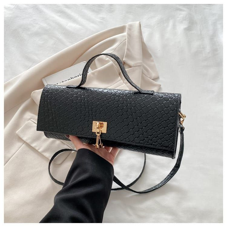 Bottega Veneta Triangle Bag – Bold Geometry, Iconic Luxury