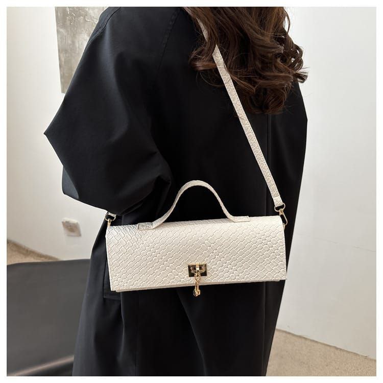 Bottega Veneta Triangle Bag – Bold Geometry, Iconic Luxury