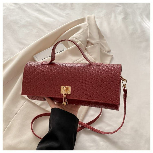 Bottega Veneta Triangle Bag – Bold Geometry, Iconic Luxury